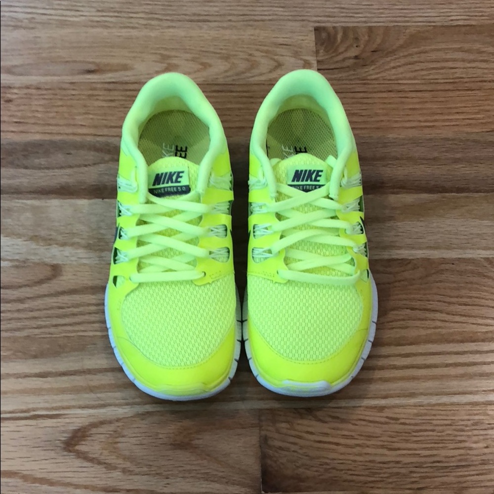Yellow Nike free runs